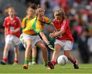 26 August 2012; Ciara Neville, Monaleen N.S., Castletroy, Co. Limerick, left, in action against Emma Louise Mc Areavey, Mount St. Michael's P.S., Co. Antrim, during the INTO/RESPECT Exhibition GoGames at the GAA Football All-Ireland Senior Championship Semi-Final between Cork and Donegal. Croke Park, Dublin. Picture credit: Tomas Greally / SPORTSFILE