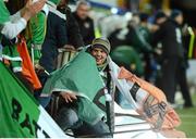 16 October 2012; A Republic of Ireland supporter falls through a security fence at the end of the game. 2014 FIFA World Cup Qualifier, Group C, Faroe Islands v Republic of Ireland, Torsvollur Stadium, Torshavn, Faroe Islands. Picture credit: David Maher / SPORTSFILE