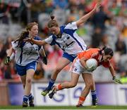7 October 2012; Mairead Tennyson, Armagh, in action against Aoife Landers, left, and Karen McGrath, Waterford. TG4 All-Ireland Ladies Football Intermediate Championship Final, Armagh v Waterford, Croke Park, Dublin. Picture credit: Stephen McCarthy / SPORTSFILE
