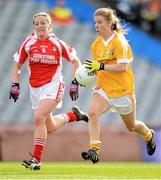7 October 2012; Mairead Cooper, Antrim, in action against Marie O'Connell, Louth. TG4 All-Ireland Ladies Football Junior Championship Final, Antrim v Louth, Croke Park, Dublin. Picture credit: Stephen McCarthy / SPORTSFILE