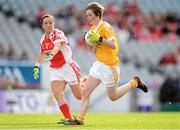 7 October 2012; Kirsty McGuinness, Antrim, in action against Aine McGeel, Louth. TG4 All-Ireland Ladies Football Junior Championship Final, Antrim v Louth, Croke Park, Dublin. Picture credit: Stephen McCarthy / SPORTSFILE