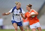7 October 2012; Shauna O'Hagan, Armagh, in action against Grainne Enright, Waterford. TG4 All-Ireland Ladies Football Intermediate Championship Final, Armagh v Waterford, Croke Park, Dublin. Picture credit: Stephen McCarthy / SPORTSFILE