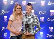 18 October 2012; Clare half back Seadna Morey has been voted the 2012 Bord Gáis Energy Breaking Through Player of the Year. The Sixmilebridge clubman was picked from a shortlist of six that included fellow Clare players Patrick O’Connor and Tony Kelly to claim the €1,000 prize voucher. Also in the running were Kilkenny duo Ger Aylward and Walter Walsh and finally Tipperary captain John O’Dwyer. The Breaking Through Player of the Year award recognises the overall stand out player of the 2012 Championship and is voted for by a panel made up of Bord Gáis Energy Sport Ambassador and Cork selector, Ger Cunningham, Micheál O Domhnaill of TG4, Bord Gáis Energy Ambassador Joe Canning and former Waterford great Ken McGrath. Pictured at the event in Croke Park is 2012 Bord Gáis Energy Breaking Through Player of the Year Clare's Seadna Morey with Annalee O'Donovan. 2012 Bord Gáis Energy Breaking Through Player of the Year, Croke Park, Dublin. Picture credit: Brian Lawless / SPORTSFILE