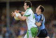 21 October 2012; Mark Hughes, Emmet Óg Killoe, in action against Garrett Ghee, Longford Slashers. Longford County Senior Football Championship Final Replay, Longford Slashers v Emmet Óg Killoe, Glennon Brothers Pearse Park, Co. Longford. Picture credit: Brian Lawless / SPORTSFILE