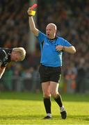 21 October 2012; Referee Richard Moloney issues a second yellow and subsequent red card to James Kelly, Newcastlewest. Limerick County Senior Football Championship Final, Dromcollogher Broadford v Newcastlewest, Gaelic Grounds, Limerick. Picture credit: Diarmuid Greene / SPORTSFILE