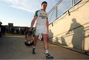 21 October 2012; Barry Regan, Ballaghaderreen, walks back to the team dressing room with the cup after the game. Mayo County Senior Football Championship Final, Ballintubber v Ballaghaderreen, Elverys MacHale Park, Castlebar, Co. Mayo. Picture credit: David Maher / SPORTSFILE