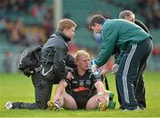 21 October 2012; James Kelly of Newcastlewest receives attention following an incident involving a supporter. Limerick County Senior Football Championship Final, Dromcollogher Broadford v Newcastlewest, Gaelic Grounds, Limerick. Picture credit: Diarmuid Greene / SPORTSFILE