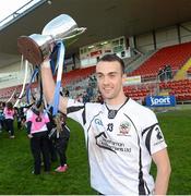 21 October 2012; Conor Laverty, Kilcoo, celebrates with the cup. Down County Senior Football Championship Final, Mayobridge v Kilcoo, Pairc Esler, Newry, Co. Down. Picture credit: Oliver McVeigh / SPORTSFILE