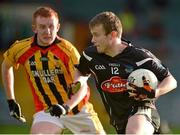21 October 2012; Jamie Lee, Newcastlewest, in action against Brian Noonan, Dromcollogher Broadford. Limerick County Senior Football Championship Final, Dromcollogher Broadford v Newcastlewest, Gaelic Grounds, Limerick. Picture credit: Diarmuid Greene / SPORTSFILE
