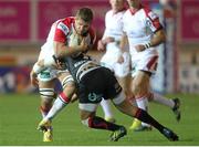 26 October 2012; Chris Henry, Ulster, is tackled by Lewis Robling, Newport Gwent Dragons. Celtic League 2012/13, Round 7, Newport Gwent Dragons v Ulster, Rodney Parade, Newport, Wales. Picture credit: Steve Pope / SPORTSFILE