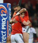26 October 2012; Felix Jones, Munster, is congratulated by team-mate Simon Zebo after scoring their side's second try. Celtic League 2012/13, Round 7, Munster v Zebre, Thomond Park, Limerick. Picture credit: Matt Browne / SPORTSFILE