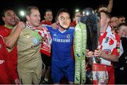 26 October 2012; Sligo Rovers players, from left to right, Gavin Peers, Gary Rogers, and Iarflaith Davoran, wearing a John Terry mask, celebrate with the Airtricity League Premier Division trophy. Airtricity League Premier Division, Sligo Rovers v Shamrock Rovers, Showgrounds, Sligo. Picture credit: David Maher / SPORTSFILE