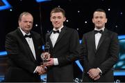 26 October 2012; Brian Corcoran, Louth, is presented with his 2012 Nicky Rackard Champion 15 Award by Liam Ó Néill, left, Uachtarán, Chumann Lúthchleas Gael and Donal Og Cusack, right, Chairman, Gaelic Players Association. GAA GPA All-Star Awards 2012, National Convention Centre, Dublin. Picture credit: Brendan Moran / SPORTSFILE