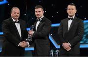 26 October 2012; David Neylon, Warwickshire, is presented with his 2012 Lory Meagher Champion 15 Award by Liam Ó Néill, left, Uachtarán, Chumann Lúthchleas Gael and Donal Og Cusack, right, Chairman, Gaelic Players Association. GAA GPA All-Star Awards 2012, National Convention Centre, Dublin. Picture credit: Brendan Moran / SPORTSFILE