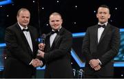 26 October 2012; John Duffy, Fermanagh, is presented with his 2012 Lory Meagher Champion 15 Award by Liam Ó Néill, left, Uachtarán, Chumann Lúthchleas Gael and Donal Og Cusack, right, Chairman, Gaelic Players Association. GAA GPA All-Star Awards 2012, National Convention Centre, Dublin. Picture credit: Brendan Moran / SPORTSFILE