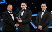 26 October 2012; Conor Grogan, Tyrone, is presented with his 2012 Lory Meagher Champion 15 Award by Liam Ó Néill, left, Uachtarán, Chumann Lúthchleas Gael and Donal Og Cusack, right, Chairman, Gaelic Players Association. GAA GPA All-Star Awards 2012, National Convention Centre, Dublin. Picture credit: Brendan Moran / SPORTSFILE