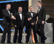 26 October 2012; Cork's Colm O'Neill receives his 2012 GAA GPA All-Star award, sponsored by Opel, from Donal Og Cusack, Chairman, Gaelic Players Association, Liam Ó Néill, Uachtarán, Chumann Lúthchleas Gael, and Dave Sheeran, Managing Director, Opel Ireland. GAA GPA All-Star Awards 2012 Sponsored by Opel, National Convention Centre, Dublin. Picture credit: Brendan Moran / SPORTSFILE