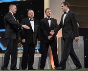 26 October 2012; Donegal's Michael Murphy receives his 2012 GAA GPA All-Star award, sponsored by Opel, from Donal Og Cusack, Chairman, Gaelic Players Association, Liam Ó Néill, Uachtarán, Chumann Lúthchleas Gael, and Dave Sheeran, Managing Director, Opel Ireland. GAA GPA All-Star Awards 2012 Sponsored by Opel, National Convention Centre, Dublin. Picture credit: Brendan Moran / SPORTSFILE