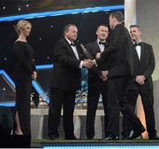 26 October 2012; Galway's David Collins receives his 2012 GAA GPA All-Star award, sponsored by Opel, from Liam Ó Néill, Uachtarán, Chumann Lúthchleas Gael,  Donal Og Cusack, Chairman, Gaelic Players Association, and Dave Sheeran, Managing Director, Opel Ireland. GAA GPA All-Star Awards 2012 Sponsored by Opel, National Convention Centre, Dublin. Picture credit: Brendan Moran / SPORTSFILE