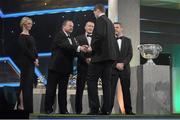 26 October 2012; Galway's Iarla Tannian receives his 2012 GAA GPA All-Star award, sponsored by Opel, from Liam Ó Néill, Uachtarán, Chumann Lúthchleas Gael,  Donal Og Cusack, Chairman, Gaelic Players Association, and Dave Sheeran, Managing Director, Opel Ireland. GAA GPA All-Star Awards 2012 Sponsored by Opel, National Convention Centre, Dublin. Picture credit: Brendan Moran / SPORTSFILE