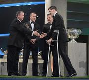 26 October 2012; Kilkenny's TJ Reid receives his 2012 GAA GPA All-Star award, sponsored by Opel, from Liam Ó Néill, Uachtarán, Chumann Lúthchleas Gael,  Donal Og Cusack, Chairman, Gaelic Players Association, and Dave Sheeran, Managing Director, Opel Ireland. GAA GPA All-Star Awards 2012 Sponsored by Opel, National Convention Centre, Dublin. Picture credit: Brendan Moran / SPORTSFILE