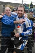 28 October 2012; The St Patrick's goalkeeper Colm Byrne celebrates with supporter Eddie Leonard after the game. AIB Leinster GAA Football Senior Club Championship, First Round, St Patrick's v Éire Óg, County Grounds, Aughrim, Co. Wicklow. Picture credit: Ray McManus / SPORTSFILE