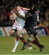26 October 2012; Paddy Wallace, Ulster, is tackled by Robert Sidoli, Newport Gwent Dragons. Celtic League 2012/13, Round 7, Newport Gwent Dragons v Ulster, Rodney Parade, Newport, Wales. Picture credit: Steve Pope / SPORTSFILE