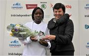 29 October 2012; Second placed athlete in the elite women's race Faith Chemaoi, Kenya, is presented with her award by Marian Kavanagh O'Neill, Race Administrator, Dublin Marathon, after the Dublin Marathon 2012. Merrion Square, Dublin. Picture credit: Brendan Moran / SPORTSFILE
