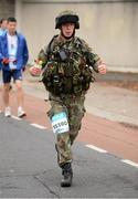 29 October 2012; Gary Condren, from Saggart, Co. Dublin, and a soldier at Cathal Brugha Barracks, competes in the Dublin Marathon 2012. Roebuck Rd, Dublin. Picture credit: Ray McManus / SPORTSFILE