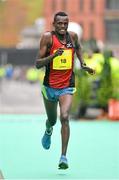 29 October 2012; Urga Negewo, Ethiopia, comes home in 4th place in the Dublin Marathon 2012. Merrion Square, Dublin. Picture credit: Brendan Moran / SPORTSFILE