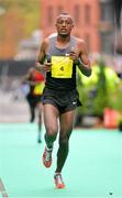 29 October 2012; Demessew Tsega, Kenya, comes home in 6th place in the Dublin Marathon 2012. Merrion Square, Dublin. Picture credit: Brendan Moran / SPORTSFILE