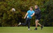 29 October 2012; Leinster head coach Joe Schmidt moves to tackle Brendan Macken during squad training ahead of their side's Celtic League, Round 8, match against Ospreys on Sunday. Leinster Rugby Squad Training, UCD, Belfield, Dublin. Picture credit: Ray McManus / SPORTSFILE