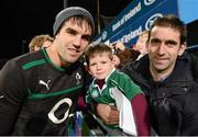 30 October 2012; Ireland's Conor Murray with Ireland supporters David Scahill and his son William Scahill, age 4, from Mullingar, during an autograph signing session after squad training ahead of Ireland's Autumn International match against South Africa on Saturday November 10th. Ireland Rugby Squad Training, Donnybrook Stadium, Donnybrook, Dublin. Picture credit: Brian Lawless / SPORTSFILE