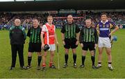 14 October 2012; Bobby Browne, Cuala, left, and Ross O'Carroll, Kilmacud Crokes, with referee Peadar Behan and his umpires before the Dublin County Senior Hurling Championship Final match between Cuala and Kilmacud Crokes at Parnell Park in Dublin. Photo by Ray McManus/Sportsfile