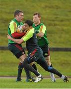 31 October 2012; Munster's JJ Hanrahan is tackled by Felix Jones during squad training ahead of their side's Celtic League 2012/13, Round 8, match against Cardiff Blues on Friday. Munster Rugby Squad Training, University of Limerick, Limerick. Picture credit: Diarmuid Greene / SPORTSFILE
