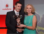 3 November 2012; Kevin Leavy accepting the Vodafone Race of the Year award for the Dublin City Triathlon, on behalf of John Walnutt from Piranha Triathlon Club, Co. Dublin, from Anne O'Leary, Enterprise Director, Vodafone Ireland. Triathlon Ireland Awards Dinner 2012, Aviva Stadium, Lansdowne Road, Dublin. Photo by Sportsfile