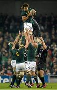 10 November 2012; Eben Etzebeth, South Africa, wins possession for his side in a lineout ahead of Ireland's Peter O'Mahony. Autumn International, Ireland v South Africa, Aviva Stadium, Lansdowne Road, Dublin. Picture credit: Stephen McCarthy / SPORTSFILE