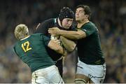 10 November 2012; Michael Bent, Ireland, is tackled by Jean de Villiers, left, and Francois Louw, South Africa. Autumn International, Ireland v South Africa, Aviva Stadium, Lansdowne Road, Dublin. Picture credit: Stephen McCarthy / SPORTSFILE