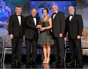 10 November 2012; Geraldine O'Flynn, Cork, is presented with her All-Star award by Pat Quill, President, Ladies Gaelic Football Association, in the company of, from left, Pol O Gallchoir, Ceannsaí, TG4,  Liam Moggan, National Coach Development Officer, Coaching Ireland, and Cormac Farrell, O'Neill's. TG4 O'Neill's Ladies Football All-Star Awards 2012, Citywest Hotel, Saggart, Co. Dublin. Picture credit: Brendan Moran / SPORTSFILE