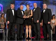 10 November 2012; Valerie Mulcahy, Cork, is presented with her All-Star award by Pat Quill, President, Ladies Gaelic Football Association, in the company of, from left, Pol O Gallchoir, Ceannsaí, TG4,  Liam Moggan, National Coach Development Officer, Coaching Ireland, and Cormac Farrell, O'Neill's. TG4 O'Neill's Ladies Football All-Star Awards 2012, Citywest Hotel, Saggart, Co. Dublin. Picture credit: Brendan Moran / SPORTSFILE