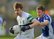 11 November 2012; Hugh Coghlan, Portlaoise, in action against Dean Healy, St. Patrick's. AIB Leinster GAA Football Senior Championship Quarter-Final, St. Patrick's, Wicklow v Portlaoise, Co. Laois, County Grounds, Aughrim, Co. Wicklow. Picture credit: Barry Cregg / SPORTSFILE