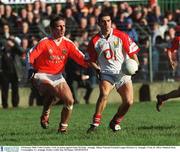 9 February 2003; Colin Crowley, Cork, in action against Enda McNulty, Armagh. Allianz National Football League Division 1A, Armagh v Cork, St. Oliver Plunkett Park, Crossmaglen, Co. Armagh. Picture credit; Ray McManus / SPORTSFILE