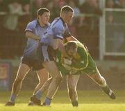 9 February 2003; Noel McGinley, Donegal, in action against Dublin's Enda Crennan and Alan Brogan, left. Allianz National Football League, Donegal v Dublin, Fr. Tierney Park, Ballyshannon, Co. Donegal. Picture credit; Brendan Moran / SPORTSFILE *EDI*