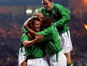12 February 2003; Republic of Ireland's Kevin Kilbane, left,  celebrates with team-mates Stephen Reid, John O'Shea (top) and Clinton Morrison, right, after scoring his sides first  goal. International Friendly. International Friendly, Scotland v Republic of Ireland, Hampden Park, Glasgow, Scotland. Soccer. Picture credit; David Maher / SPORTSFILE *EDI*