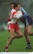 16 February 2003; Brian Dooher, Tyrone, in action against Paul Casey, Dublin, Allianz National Football League, Division 1A,  Dublin v Tyrone, Parnell Park, Dublin. Picture credit; Damien Eagers / SPORTSFILE