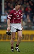 16 February 2003; Athenry's Eugene Cloonan leaves the field after being sent off by referee Seamus Roche. St Mary's, Athenry v Birr, AIB All-Ireland Club Hurling Championship Semi-Final, Cusack Park, Ennis, Co. Clare. Hurling. Picture credit; Ray McManus / SPORTSFILE *EDI*