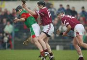 16 February 2003; Joe Errity, Birr, in action against Athenry's Eugene Cloonan and Joe Rabbitte (10). St Mary's, Athenry v Birr, AIB All-Ireland Club Hurling Championship Semi-Final, Cusack Park, Ennis, Co. Clare. Hurling. Picture credit; Ray McManus / SPORTSFILE *EDI*
