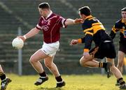 23 February 2003; Liam Moffatt, Crossmolina, fires in his shot to score his sides third goal depite the challange from Ken McTigue, Dunshaughlin. AIB All Ireland Club Football Championship Semi-final. Crossmolina v Dunshaughlin. Dr. Hyde Park, Roscommon. Picture credit; David Maher / SPORTSFILE *EDI*