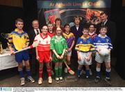 25 February 2003; Pictured at the launch of The Ladies Integration Pilot Scheme are, from left, Walter Thompson, President of The Ladies Football Association, Padhraichin Ni Raifeartaigh, President of the Camogie Association, Mary McAleese, President of Ireland, and Sean McCague, President of the GAA, with pupils of Scoil Neasain, Harmonstown. Croke Park, Dublin. Picture credit; David Maher / SPORTSFILE