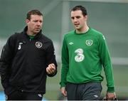 12 November 2012; Republic of Ireland's John O'Shea with goalkeeping coach Alan Kelly during squad training ahead of their side's Friendly International against Greece on Wednesday. Republic of Ireland Squad Training, Gannon Park, Malahide, Dublin. Picture credit: David Maher / SPORTSFILE